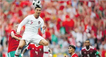  ?? FRANCISCO SECO/THE ASSOCIATED PRESS ?? Portugal star Cristiano Ronaldo continues to make up for his team’s ordinary play with the only goal of the match Wednesday in a 1-0 win over Morocco at Luzhniki Stadium in Moscow.