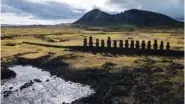  ?? AP PHOTO/ESTEBAN FELIX ?? Moai statues stand near the Rano Raraku volcano on Rapa Nui, or Easter Island, Chile, in 2022.