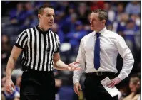  ?? AP/MARK HUMPHREY ?? Florida Coach Mike White (right) led the Gators to the 2016 NIT before taking the team to the Elite Eight in the 2017 NCAA Tournament. White said the NIT was a positive experience for the Gators.