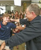  ?? SAN DIEGO UNION-TRIBUNE HAYNE PALMOUR IV/ ?? Current IronPigs outfielder Mickey Moniak hugs his father Matt while surrounded by friends and family after being the first overall pick in the 2016 MLB Draft.