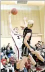  ?? Bud Sullins/Special to the Herald-Leader ?? Siloam Springs senior Josh Heinrichs, left, battles Inola (Okla.) sophomore Jordan Spurlock for the ball during the seventh-place game Saturday at the Jerry Oquin Invitation­al in Inola, Okla.