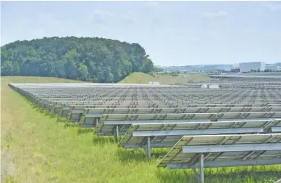  ?? STAFF FILE PHOTO ?? Volkswagen’s 65-acre solar farm stretches to the north from its main buildings at the automotive factory campus.