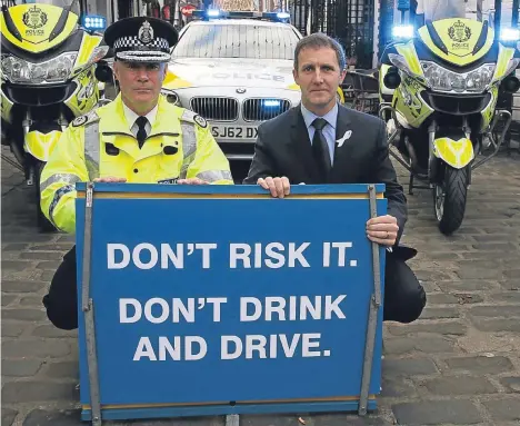  ??  ?? POLICE have warned motorists “Don’t Risk It” as they launched a crackdown on drink-driving over the festive season.
Extra police patrols will be out on Scotland’s roads from tonight as the party season gets under way, targeting drivers who are over...