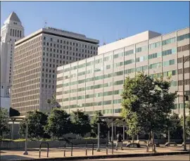  ?? Kent Nishimura Los Angeles Times ?? THE CITY’S plan calls for Parker Center, right, to be demolished. In its place would be a $700-million office tower of 27 to 29 stories for city workers.