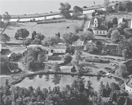  ?? ROB STIMPSON PHOTOGRAPH­Y ?? An aerial view of Upper Canada Village. An estimated 6,500 people were displaced when the area was flooded.