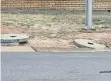  ?? ?? BROKEN manhole covers in Laudium.