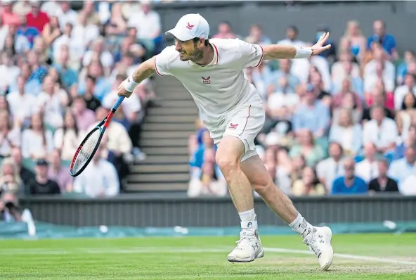  ??  ?? DENIS THE MENACE: Andy Murray plays a backhand on his way to a straight-sets defeat by talented young Canadian Denis Shapovalov.