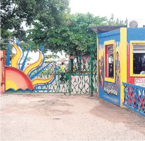  ?? PHOTO BY MARK TITUS ?? Security guards contracted by the UDC behind the closed gates at the Aquasol Beach Park in Montego Bay, St James, last Thursday.