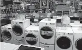  ?? AP Photo/Ted Shaffrey ?? This May 21 photo shows washing machines at a home improvemen­t store in East Rutherford, N.J. The Commerce Department released its June report on durable goods Thursday. Orders for long-lasting factory goods rose after declining for two months.