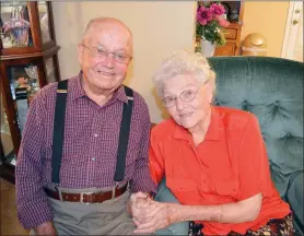  ?? FILE PHOTO ?? Coy and Rosa Shirley of Mayflower pose in their home in 2016 before their 74th wedding anniversar­y. The couple will celebrate their 75th anniversar­y Wednesday. “Seventy-five years is unbelievab­le,” Rosa said.