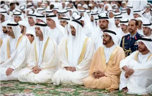  ??  ?? Sheikh Mohamed bin Zayed offers prayers at the Sheikh Zayed Grand Mosque in Abu Dhabi.