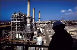  ?? RICK LOOMIS/LOS ANGELES TIMES/TNS ?? The Redondo Beach plant is one of four that may be allowed to operate past 2020. Without the gas plants, the California Public Utilities Commission said, the state may face power shortfalls as soon as summer 2021.