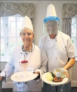  ?? ?? Resident Nora Gilliver and chef Wayne Woolman made bangers and mash and raspberry fool to celebrate British Food Fortnight