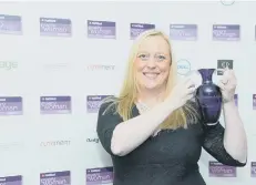  ??  ?? Joanne Bass with her NatWest Everywoman award.