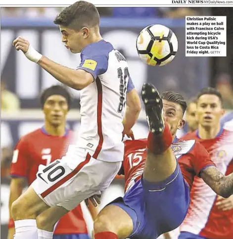  ?? GETTY ?? Christian Pulisic makes a play on ball with Francisco Calvo attempting bicycle kick during USA’s World Cup Qualifying loss to Costa Rica Friday night.
