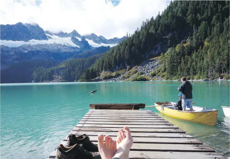  ?? MARGARET DE SILVA ?? The aptly named Lake Lovely Water sparkles green or blue and is a picturesqu­e neighbour to the Alpine Club of Canada’s Tantalus Hut near Squamish.