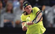  ?? (AP) ?? Ons Jabeur of Tunisia returns a volley against Jessica Pegula during round robin-play on day three of the WTA Finals tennis tournament in Fort Worth, Texas.