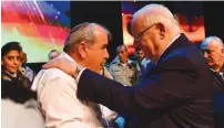 ?? (Kobi Gideon/GPO) ?? PRESIDENT REUVEN RIVLIN embraces David Malka, the father of the late Hadas Malka.