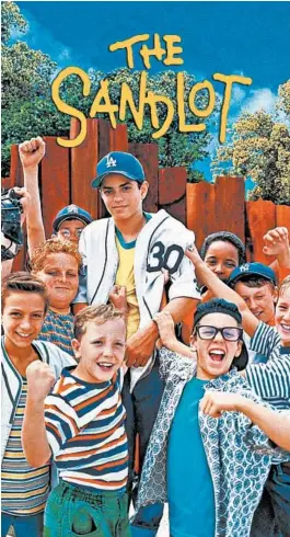  ??  ?? < “The Sandlot” is ranked the No. 1 sports movie for kids by one team of reviewers.