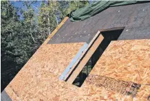  ?? MAXWELL ?? This roof is being insulated from the top using rigid sheets of extruded polystyren­e foam. It allows the roof boards and rafters to remain visible from inside when maximum insulation levels are not needed.steve