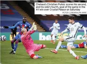  ?? PETER CZIBORRA/PA WIRE ?? Chelsea’s Christian Pulisic scores his second, and his side’s fourth, goal of the game in the 4-1 win over Crystal Palace on Saturday