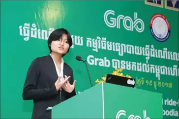  ?? HONG MENEA ?? Grab co-founder Hooi Ling Tan speaks at the ride-hailing app’s launch in the Kingdom last week. In an interivew with she discussed the company’s plans for the future in Cambodia.