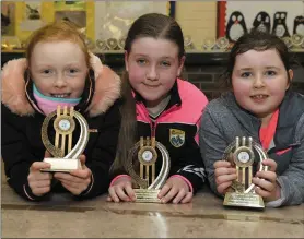  ?? Photos by Domnick Walsh ?? Chloe Dillon, Asia Fitzgerald andOrla Dowling from Duagh with their trophies at the big awards night on Friday.