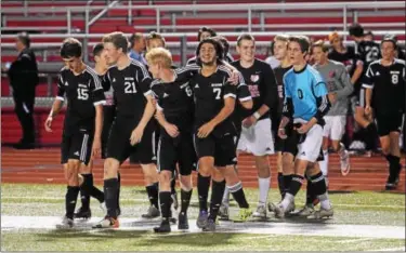  ?? AUSTIN HERTZOG - DIGITAL FIRST MEDIA ?? Boyertown players celebrate after winning a second straight PAC championsh­ip Thursday in a 3-1 win over Pottsgrove.