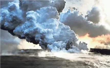  ?? ROBERT HANASHIRO/USA TODAY ?? Lava from the Kilauea volcano hits the Pacific Ocean, producing dangerous clouds of steam.