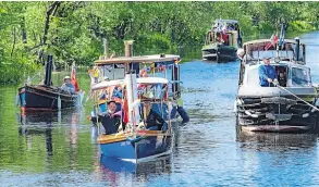  ?? PHOTO: DEVLIN PHOTO LTD ?? Boats taking part in 2019’s canal celebratio­n on the Forth & Clyde Canal.