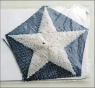  ?? 06_a21USstars­01 ?? The star inside its plastic pouch.