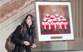  ?? ADRIAN WYLD / THE CANADIAN PRESS FILES ?? École Polytechni­que shooting survivor Nathalie Provost leaves the Supreme Court of Canada following a decision on Quebec’s gun control records in March 2015.