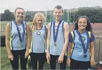  ??  ?? Rising track and field stars: Halifax Harriers’ (from left) Lucy Puddephatt, Lucy Hall, Max Burgin and Ella Gill.