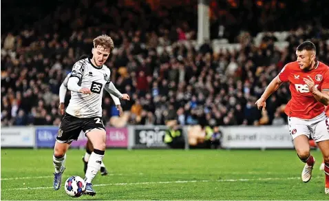  ?? ?? WINNER: Daniel Butterwort­h scored the only goal of the game for Port Vale. All photos by Tom Green