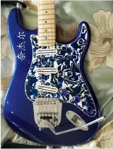  ??  ?? Right: Nigel Vine’s striking Strat-inspired ‘Blue Jewel’ Far right: Richard Stentiford’s unique Gordon Smith guitar features a GS Vibrato and Volumax passive boost