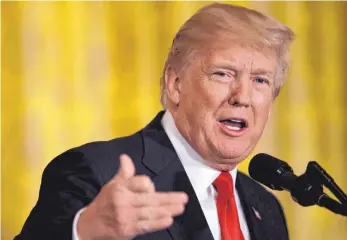  ?? FOTO: DPA ?? US-Präsident Donald Trump im East Room des Weißen Hauses: Vergeltung für den aus US-Perspektiv­e unfairen Kampf ausländisc­her Konzerne gegen die heimische US-Industrie.