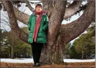  ?? Robert F. Bukaty/AP ?? Monument: Roxanne Quimby, the founder of Burt's Bees, poses next to white pine in Portland, Maine. Maine Gov. Paul LePage has asked Republican President Donald Trump to undo Democratic former President Barack Obama’s designatio­n of a national monument...