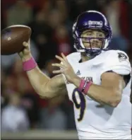  ?? JOHN MINCHILLO — THE ASSOCIATED PRESS ?? In this file photo, East Carolina quarterbac­k Philip Nelson throws in Cincinnati. Montana’s Brady Gustafson and Nelson are the other quarterbac­ks in this year’s draft. Both have potential to be surprises and enjoy successful careers in the NFL.