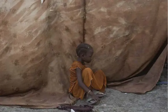  ?? TYLER HICKS/THE NEW YORK TIMES ?? A child at an United Nations compound, where more than 7,000 people have arrived in the last two months, swelling the population to more than 30,000, near Malakal, South Sudan.