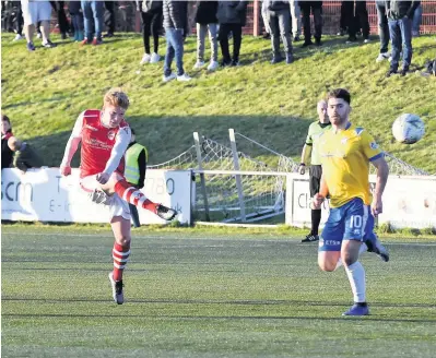  ??  ?? Wonder strike Craig Scott lets fly from 25 yards for Broxburn’s second goal