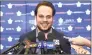  ?? Nathan Denette / Associated Press ?? Maple Leafs center Auston Matthews smiles at a news conference in Toronto. Matthews could soon wear the “C” as the long-term captain in Toronto. But he also got razzed by his teammates for doing a GQ fashion shoot.