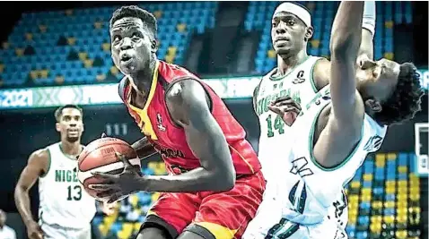 ?? ?? Nigeria’s D’tigers lost to Uganda a day after losing to Libya