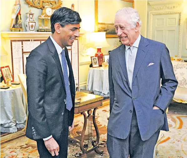  ?? ?? The King holds his first meeting this year with Rishi Sunak, the Prime Minister. Footage from the start of the audience at Buckingham Palace show His Majesty appearing to be in good health