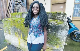 ?? DARREN STONE, TIMES COLONIST ?? Victoria youth poet laureate Ann-Bernice Thomas performs at her first official function Thursday at 7 p.m. at a city council meeting.