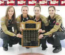  ?? DEAN PILLING ?? From left, Rachel Homan, Emma Miskey, Joanne Courtney and Lisa Weagle hold up the championsh­ip plaque at the Calgary Curling Club.