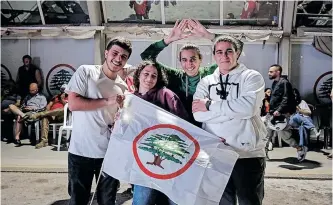  ?? ?? SUPPORTERS of the Lebanese Forces party in the northern coastal city of Batroun celebrate their party’s success in Sunday’s elections. Independen­t candidates won at least 13 seats in the new parliament, making unpreceden­ted gains, according to results announced this week. | AFP