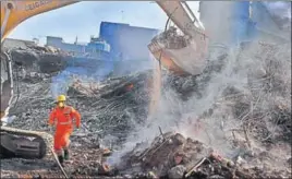 ??  ?? Rescue operations are still going on at the factory site in Ludhiana, where 13 people were killed in a devastatin­g blaze that triggered a building collapse, on Thursday. GURPREET SINGH/HT