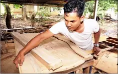  ??  ?? Mohammad Shuib uses wood from Buku Lima, Sentang, Merawan and Merbau trees to make furniture as ordered by his customers.