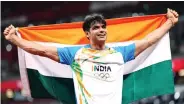  ??  ?? Athlete Neeraj Chopra brings gold for India in javelin throw final, at Tokyo Olympics 2020, in Tokyo on Saturday