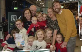  ??  ?? home again: Above, The Kelly family is reunited at Dublin Airport yesterday